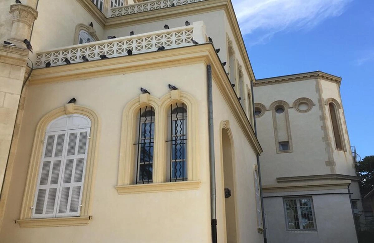 The soft cream tones and crisp detailing reflect premium painting services that enhance luxury residences in Dubai.