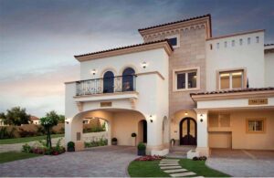 Why Do Dubai Villa Exteriors Need Repainting Every 2 Years ? | Elegant semi-detached villa in Dubai with smooth cream walls, ideal for premium House Painting Company in Dubai.